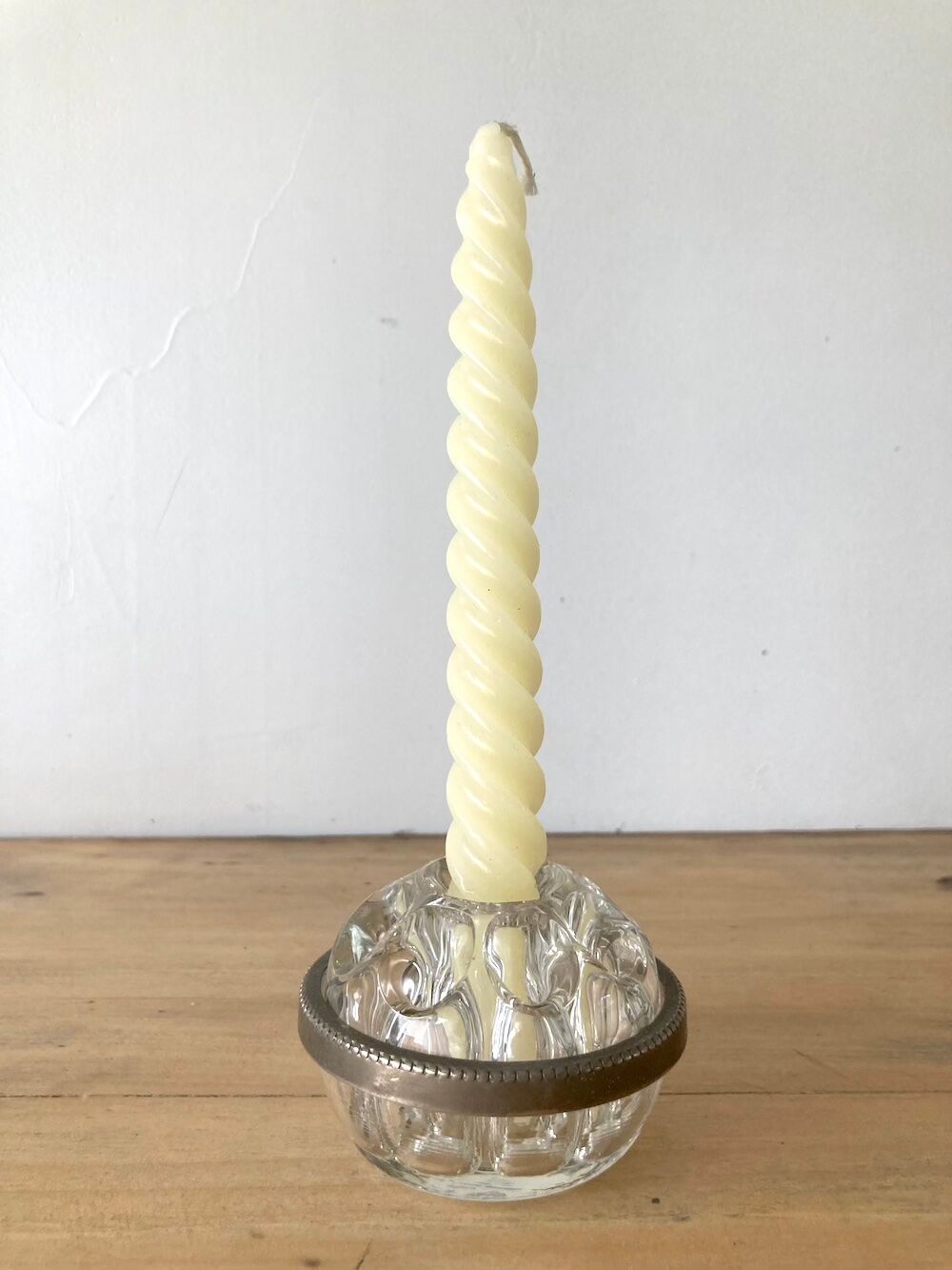 Pique flowers in metal circled glass