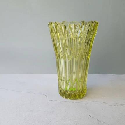Large Czech vase in pressed glass, tinted yellow with geometric shapes.