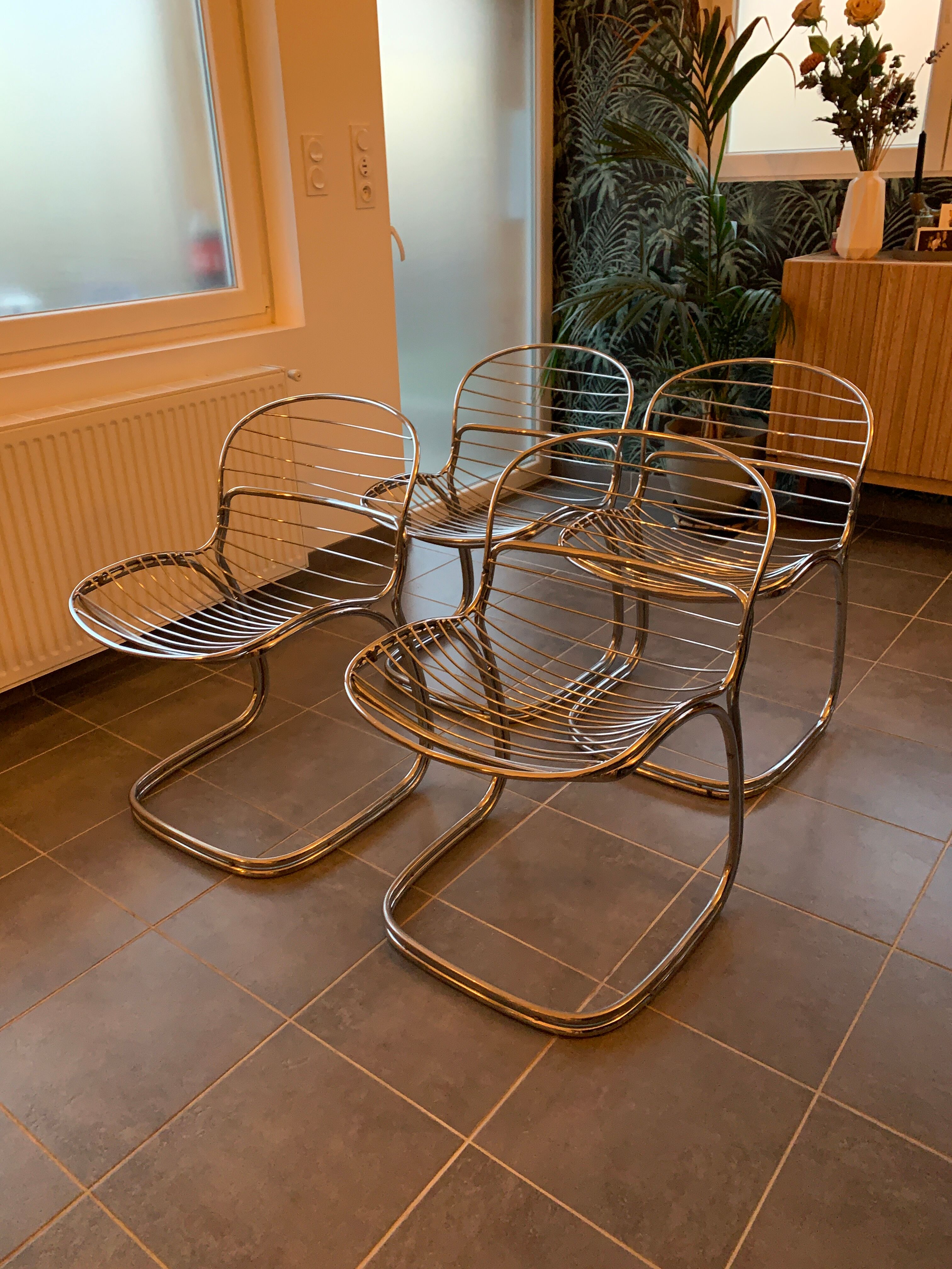 Suite of 4 suspended chairs Chromées Modele Sabrina by Gastone RINALDI