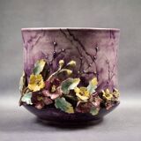Slip planter with floral decoration