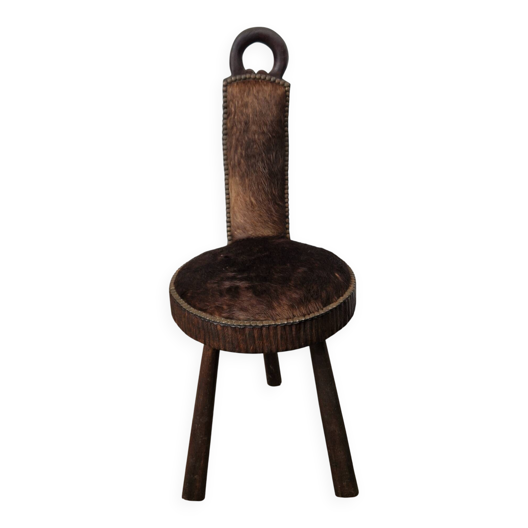 Antique tripod chair in solid wood and animal skin.