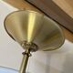 Floor lamp, brass torchère with neoclassical decoration, Empire style.