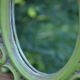 Small green wooden mirror