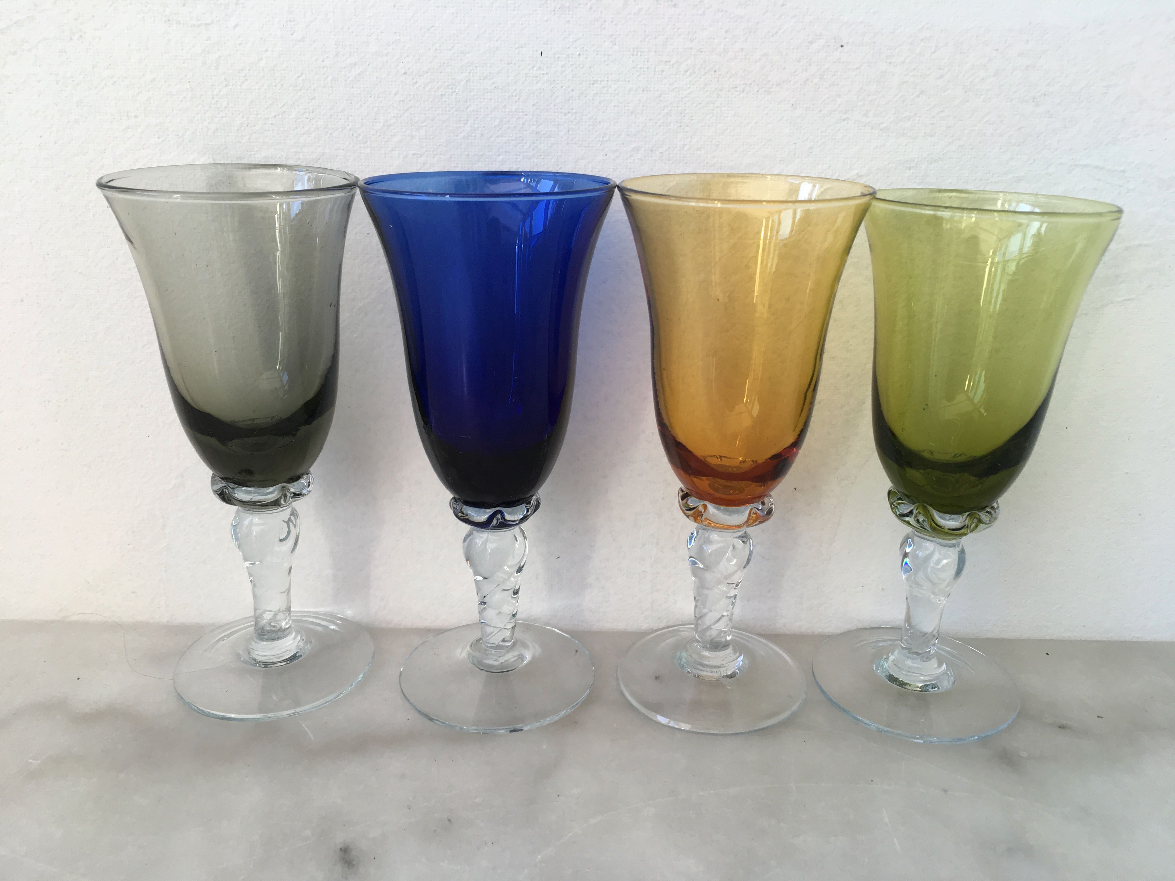 Set of four colored blown glasses