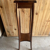 Wooden pedestal table