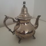Oriental teapot in silver metal