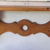 Rustic honey-colored varnished pine shelf