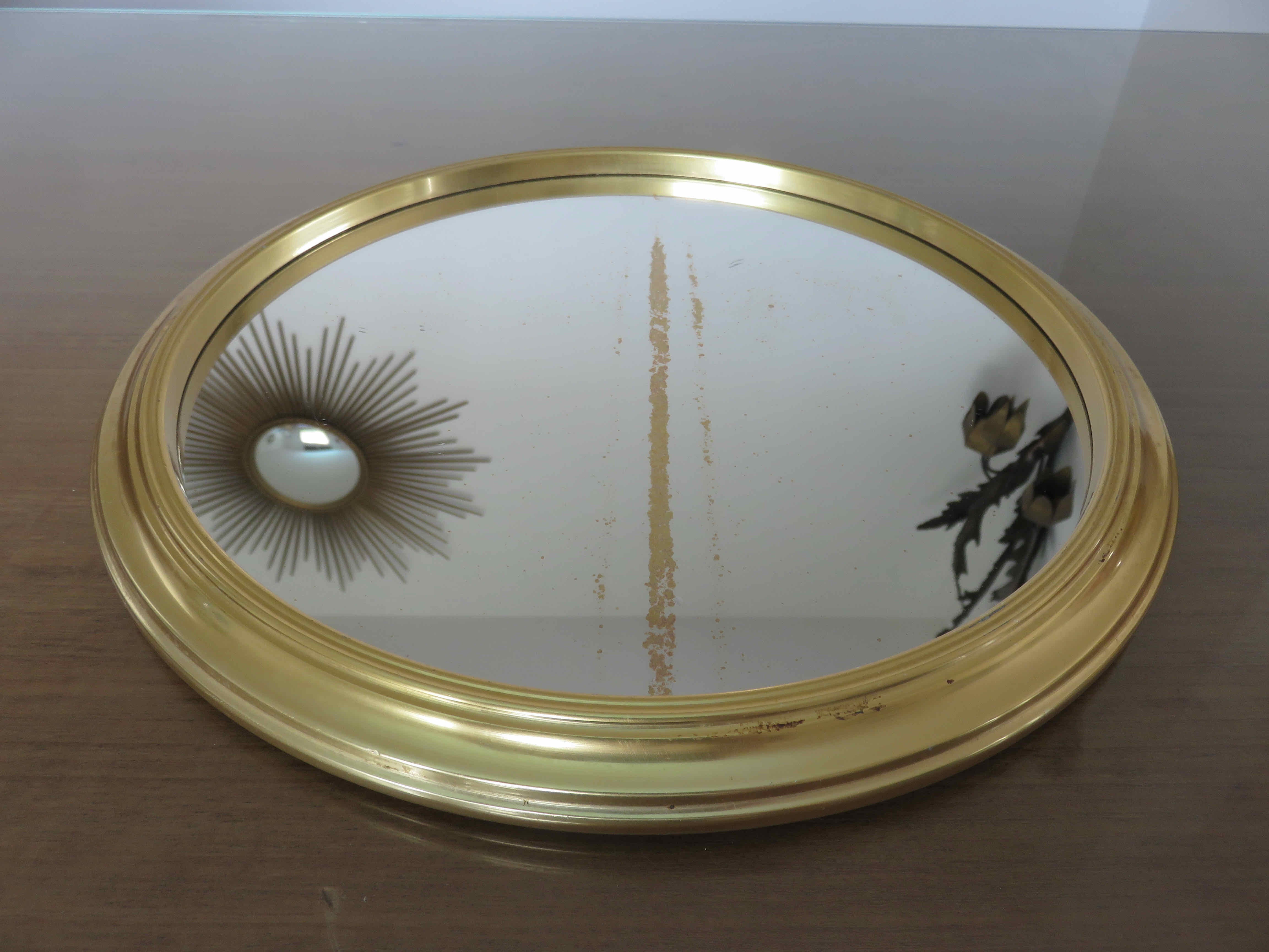 Round mirror top in gilded aluminum art deco