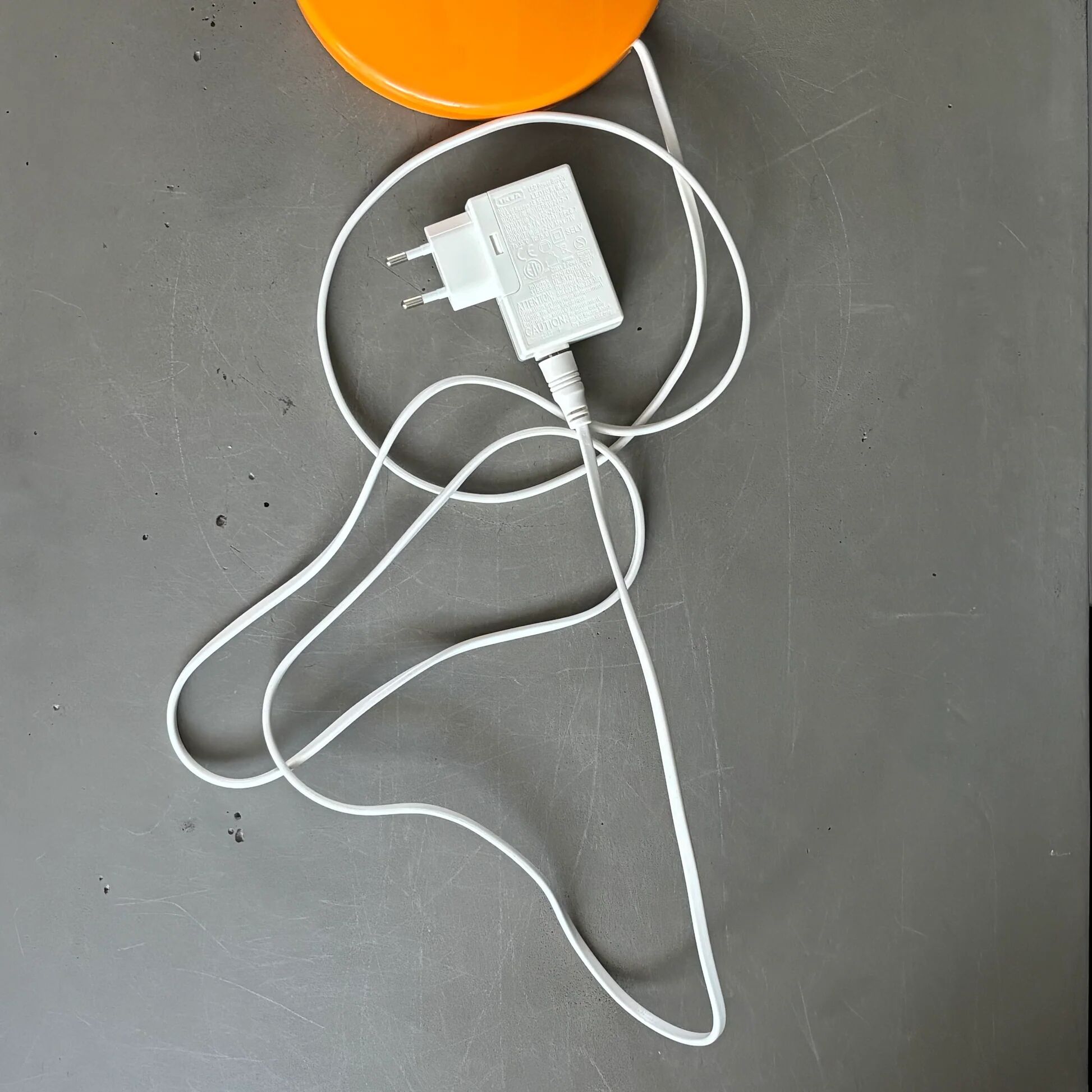 IKEA Skojig orange lamp, by designer Henrik Preutz.