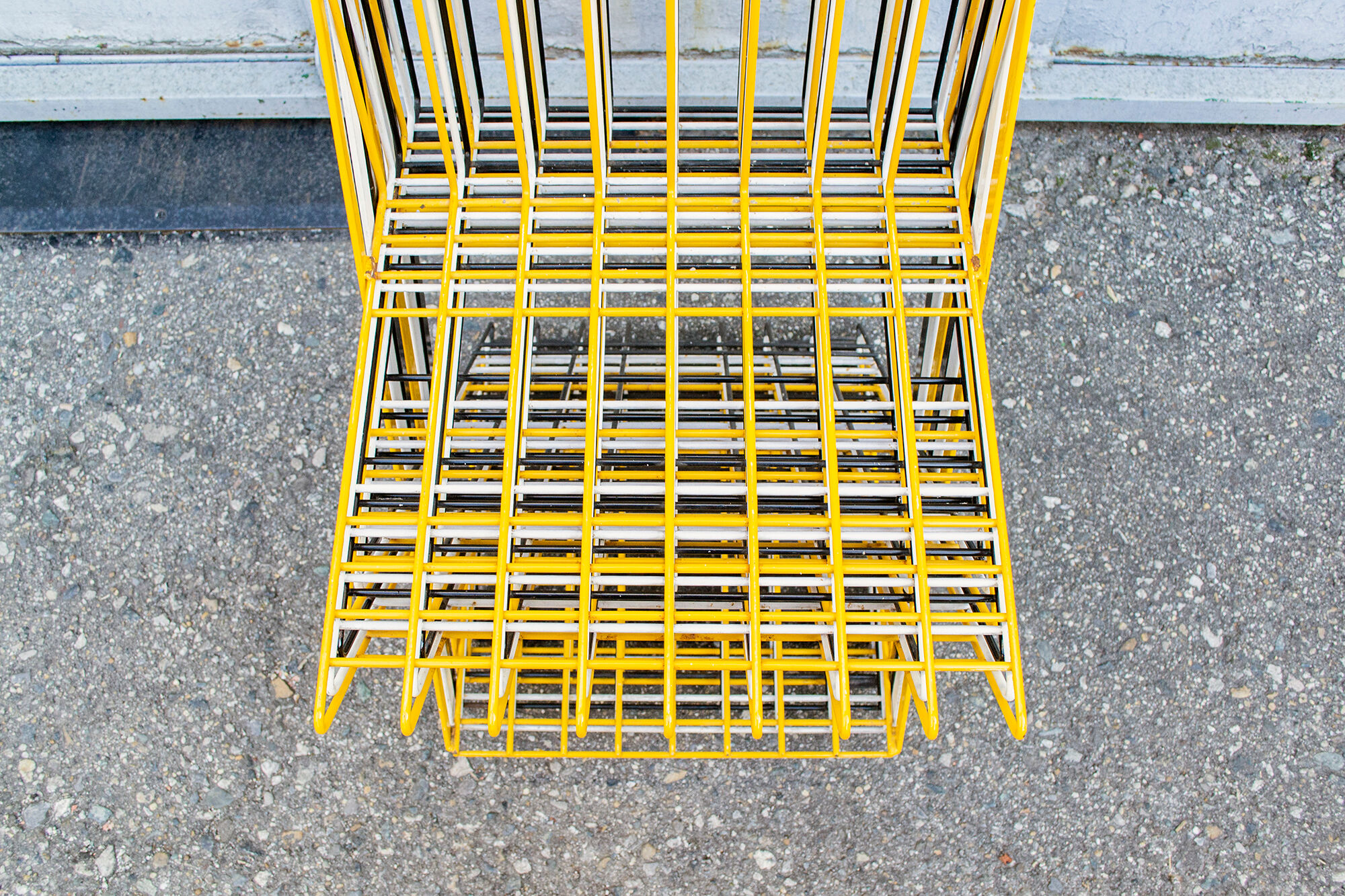 Stackable brutalist iron chairs Italy 70s