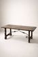Spanish table in walnut and wrought iron, lyre-shaped base.