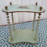 Shelf coils monogrammed patinated wood