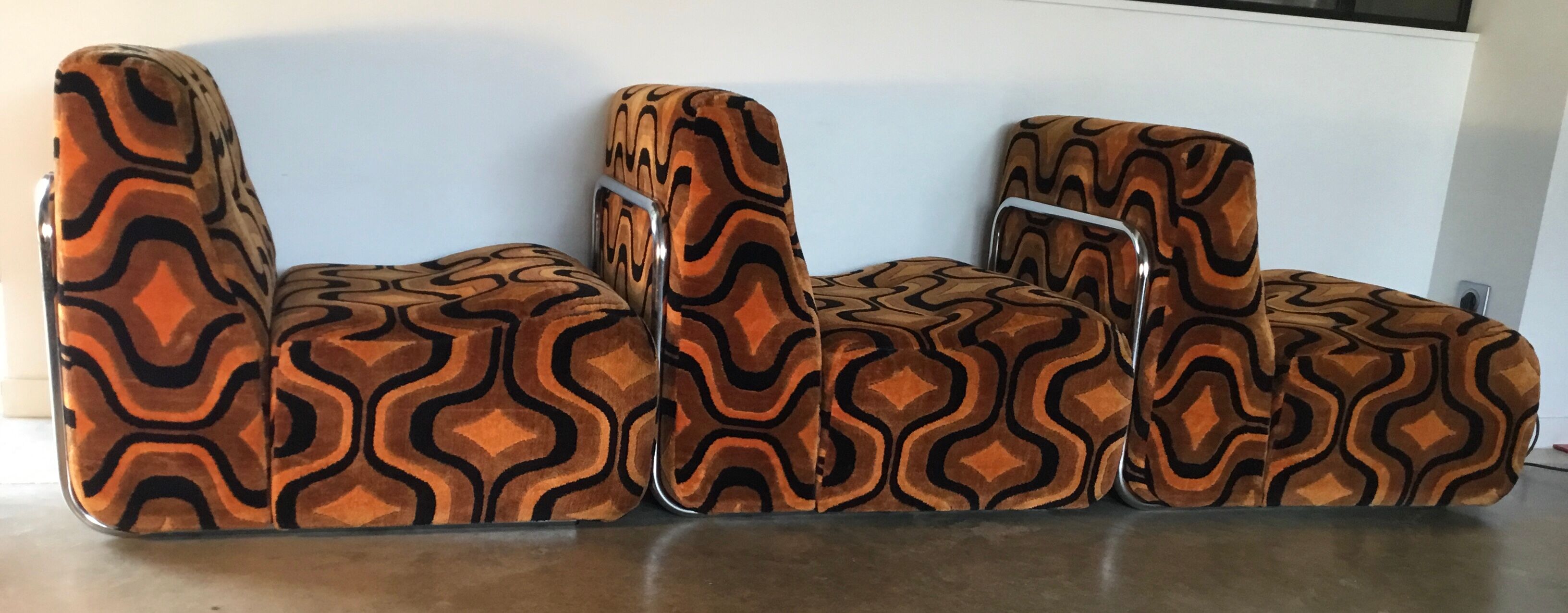 Vintage 1970s orange geometric patterned space-age armchair
