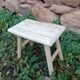 Small stool in raw wood