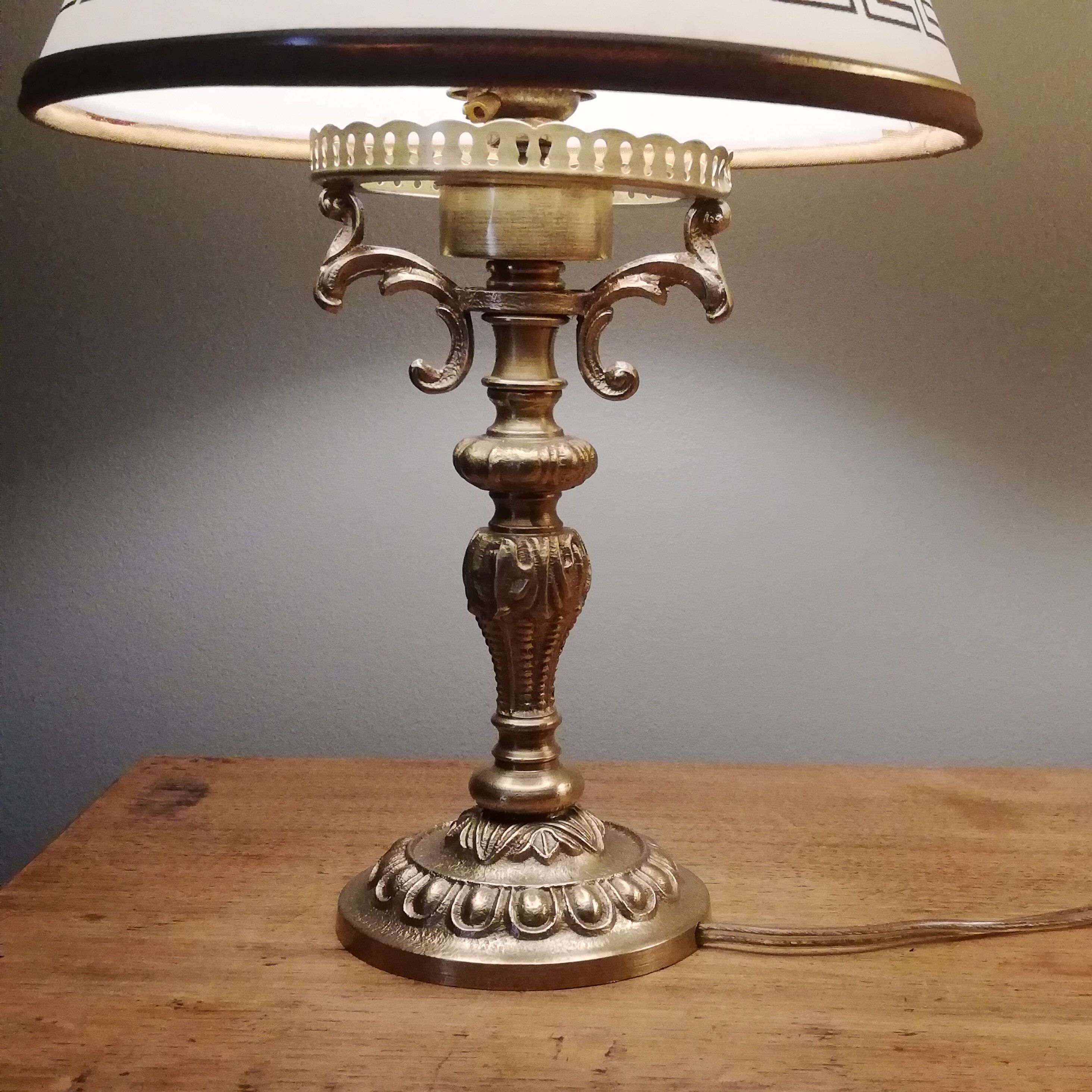 Pair of gilded bronze bedside lamps