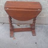 Coffee table with drop-leaf doors