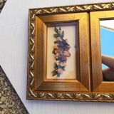 Wooden mirror with floral composition