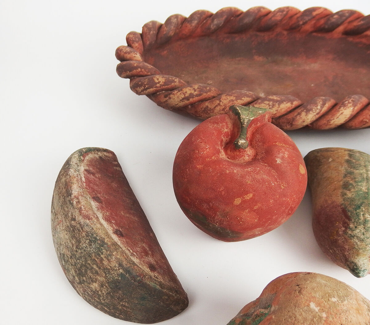 Basket and terracotta fruit