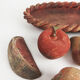 Basket and terracotta fruit