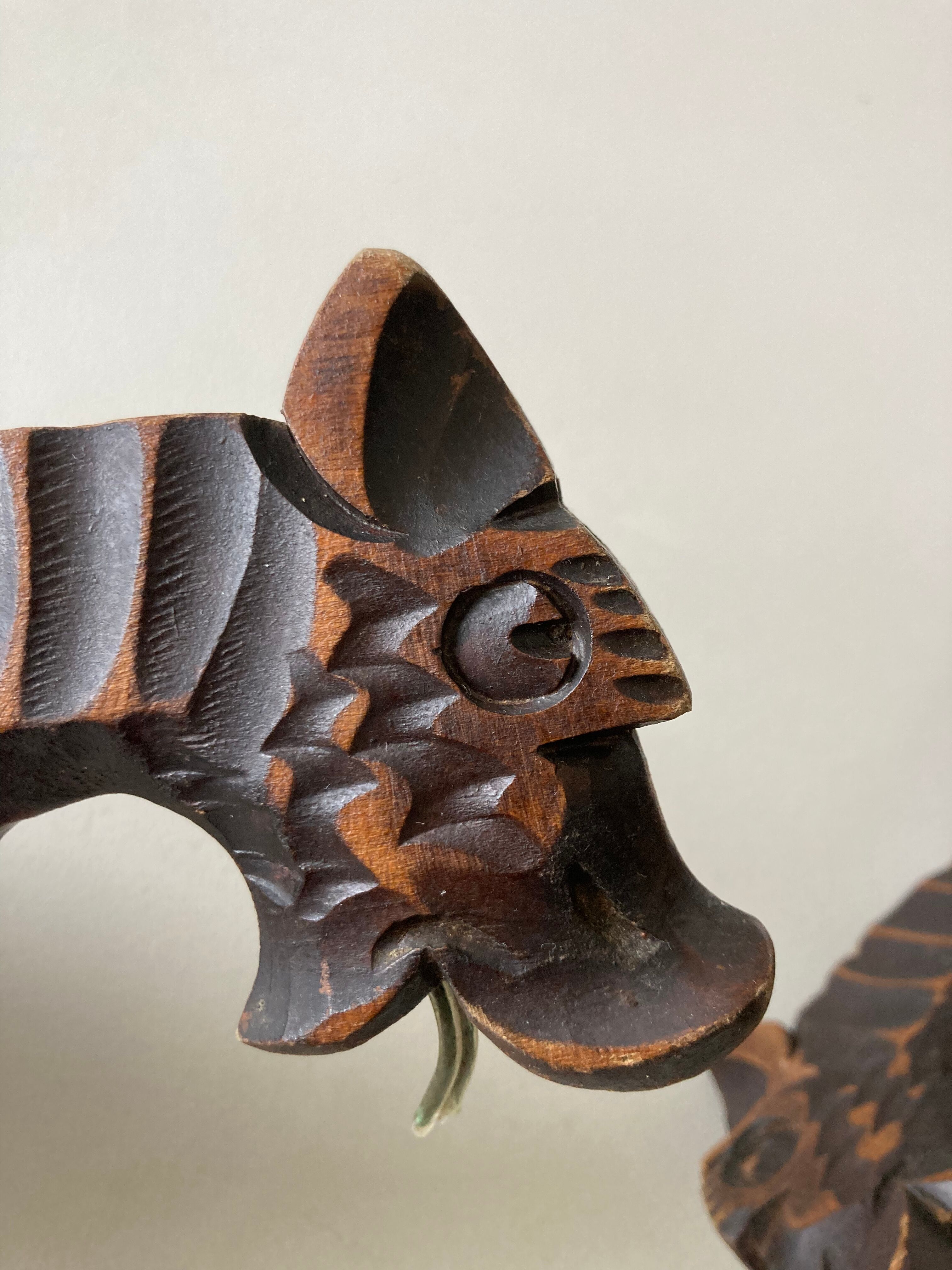 Pair of winged dragon sconces in carved wood