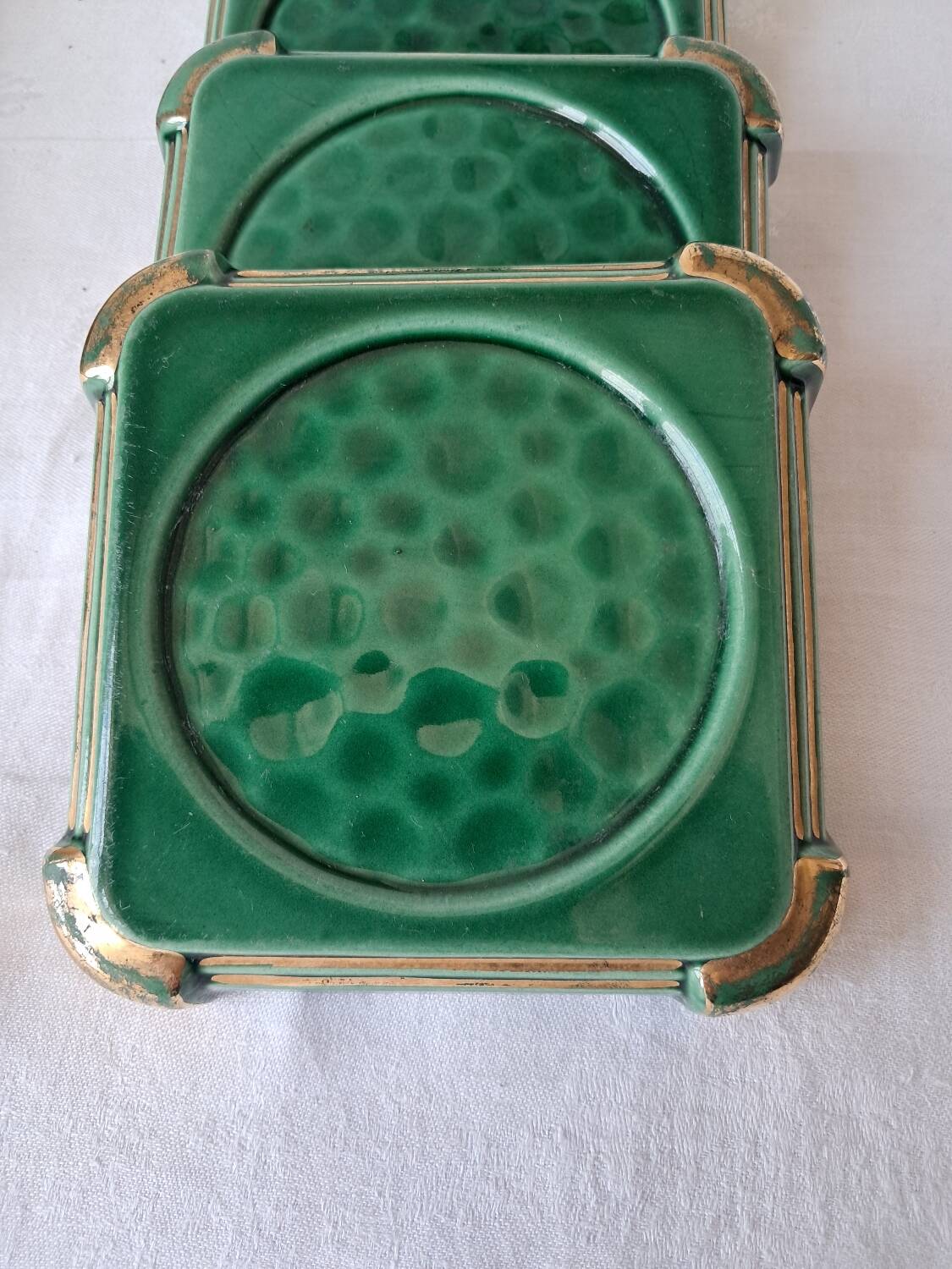 Ceramic trivets and glasses from Poët-Laval. Vintage