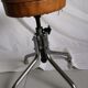 Vintage rotating stool seated in leather and chrome legs