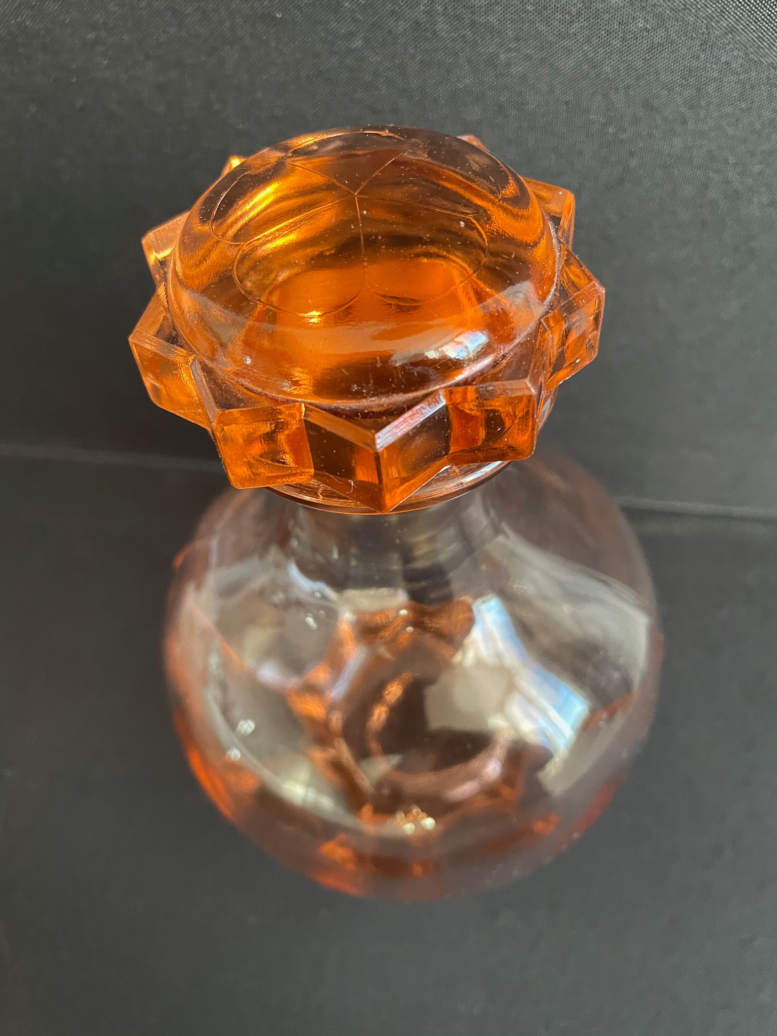 Liquor service in pink moulded glass