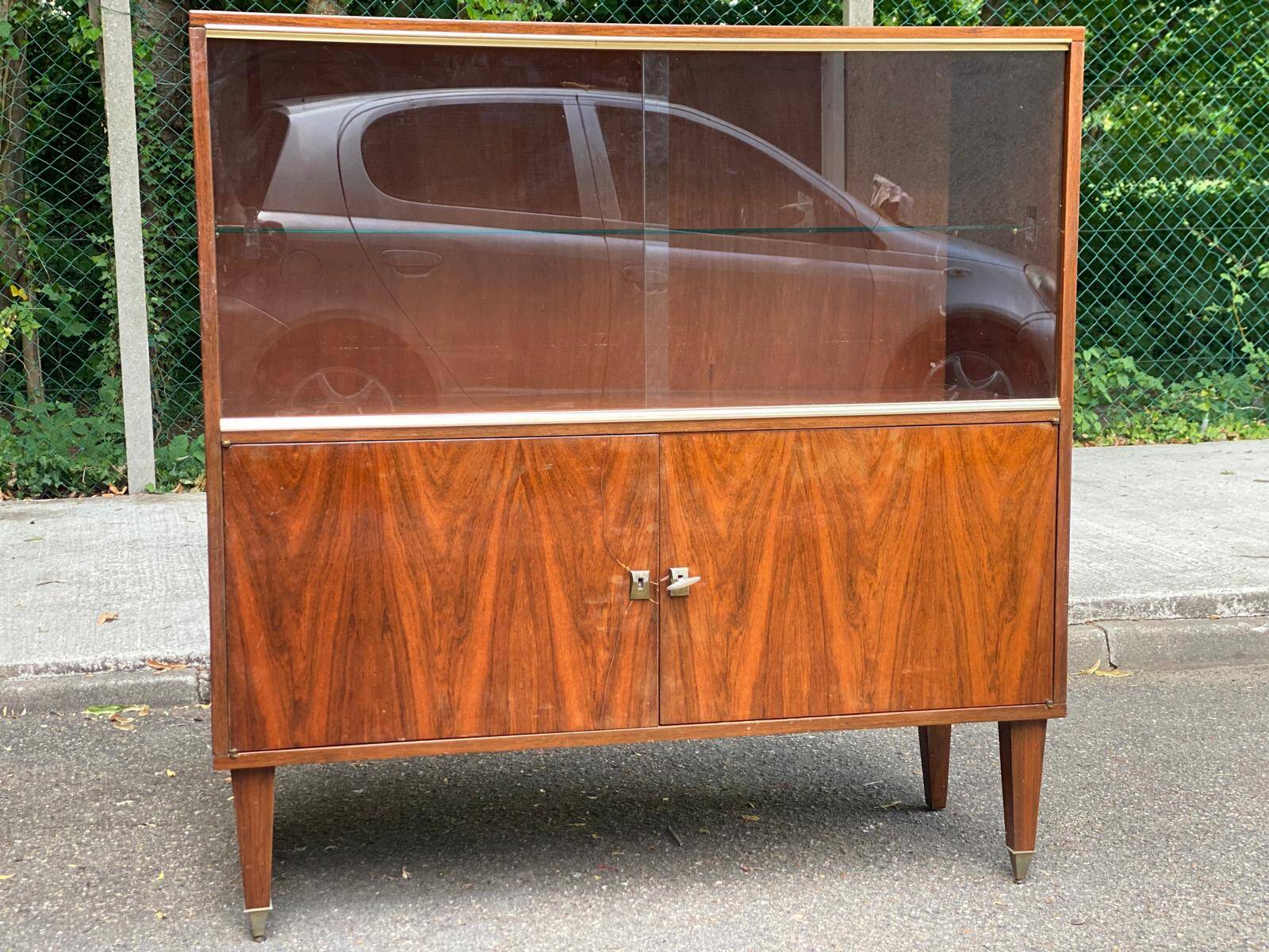Scandinavian high buffet display cabinet in rosewood from the 1950s.