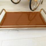 Rolling trolley in gold metal