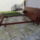 Vintage Scandinavian teak adult bed from the 60s and 70s bedside table.