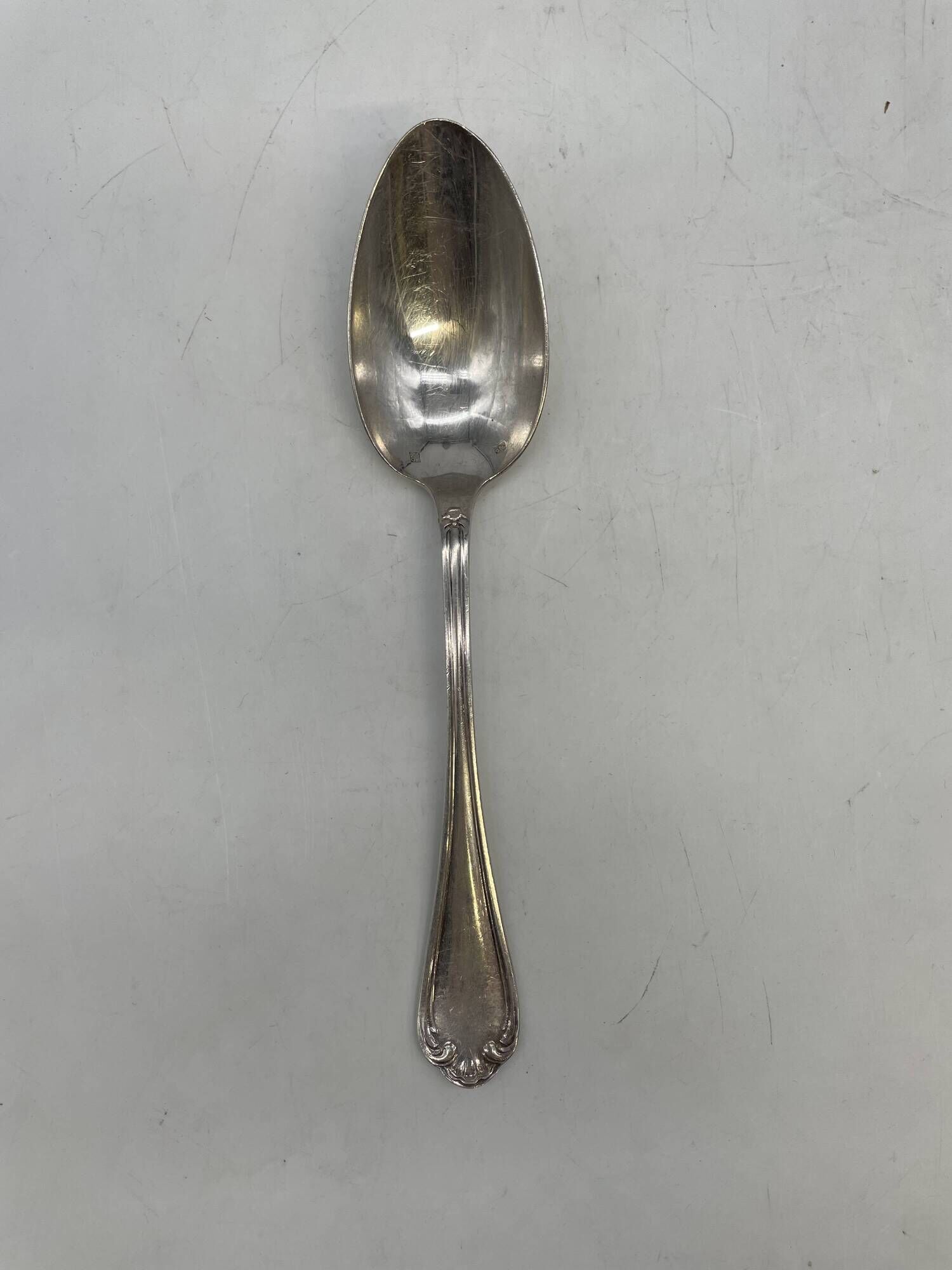 Lot de 7 cuillères à potage en métal argenté bas motif Louis XV
