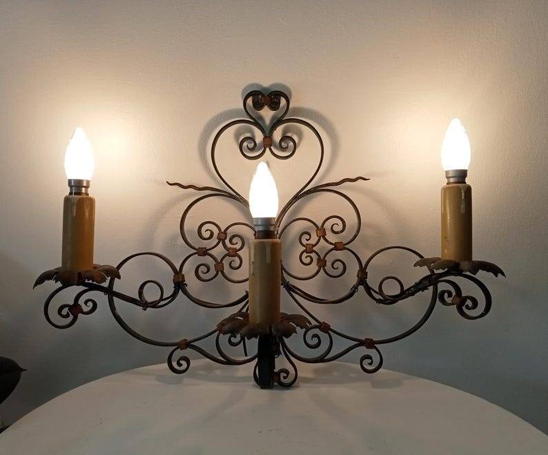 Antique wrought iron wall light from the 50s