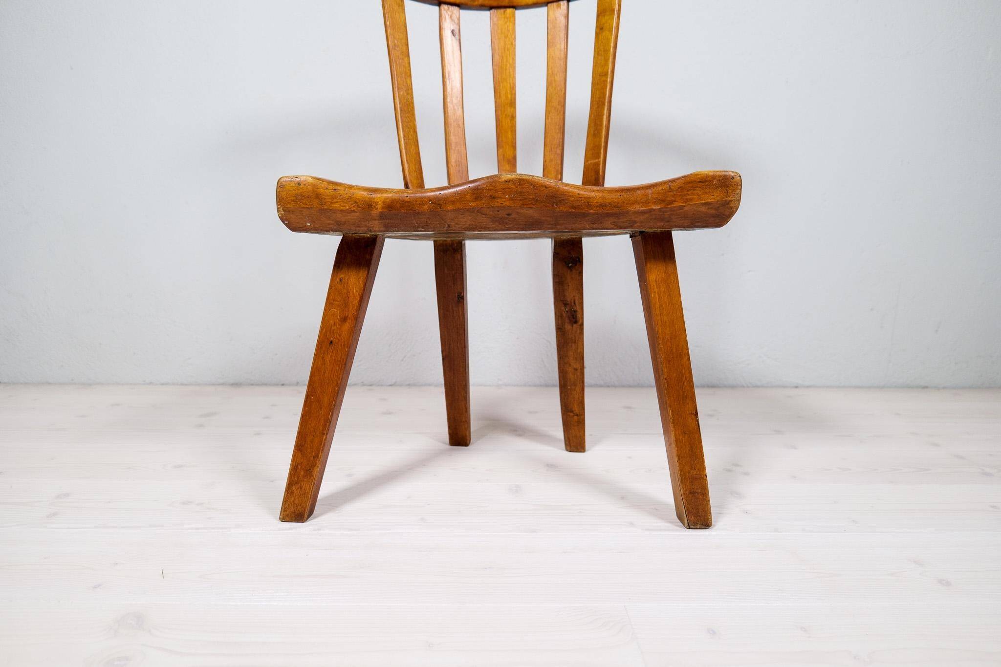 Swedish folk art chair from the 19th century with highly decorative forms.