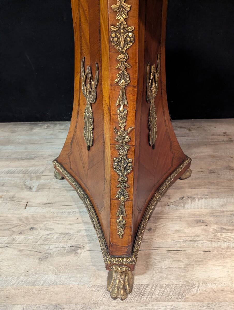 Circular gueridon in marquetry and bronze, Empire style