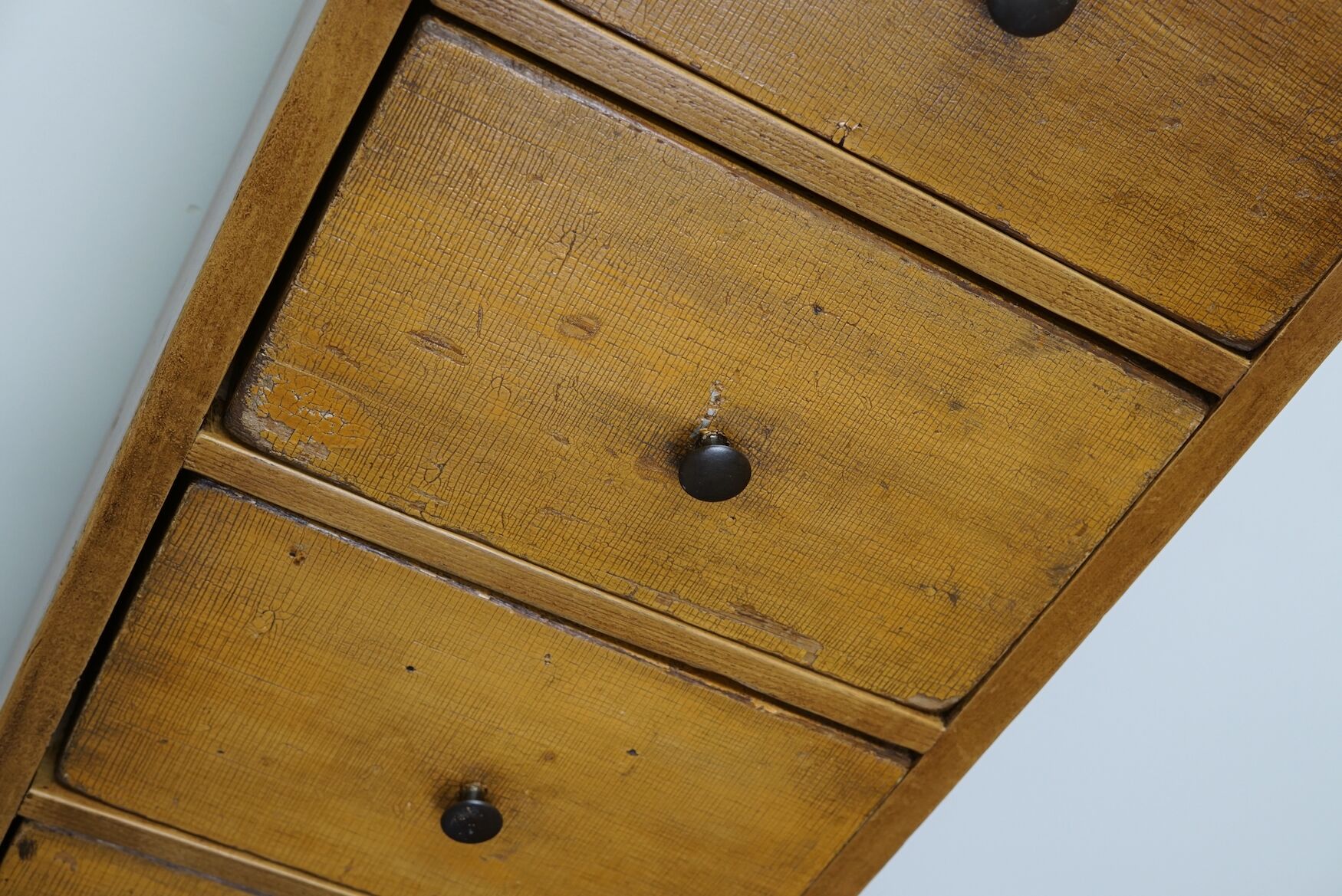 Antique dutch ochre drawer cabinet, early 20th century