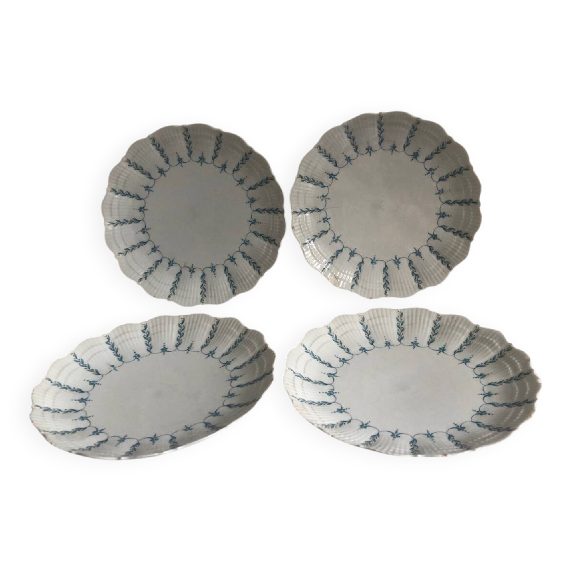 Set of 4 antique Giraud Sauviat porcelain plates.