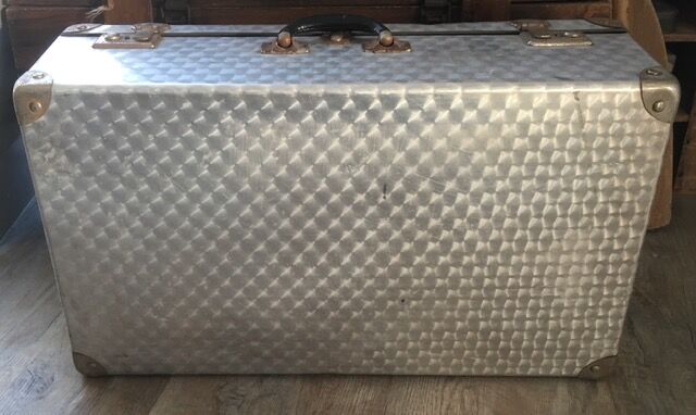 Large vintage suitcase in light metal