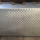 Large vintage suitcase in light metal