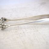 Silver metal candy box and pliers