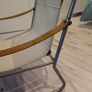 Scandinavian living room armchair in tubular chrome and leather