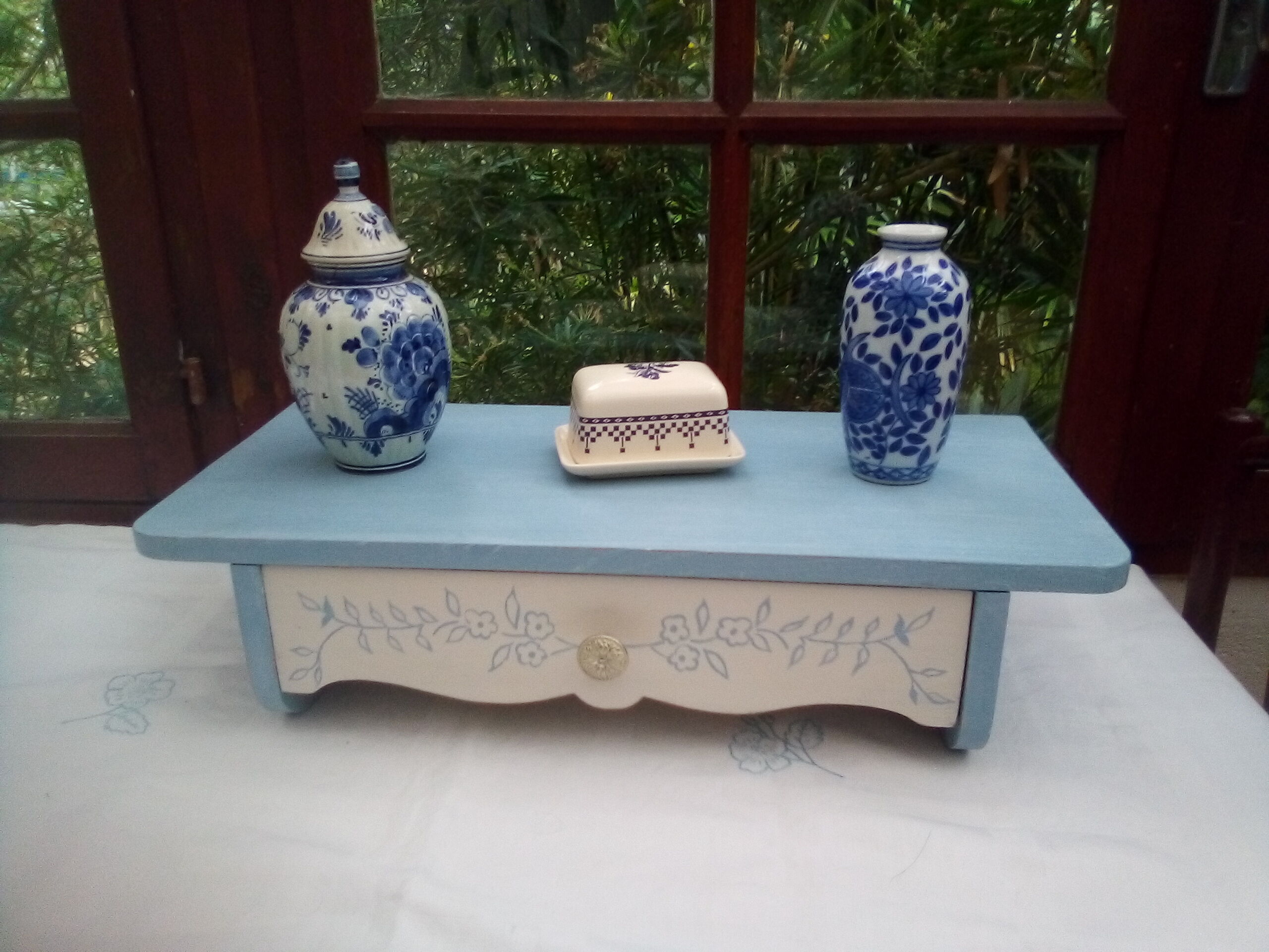 Old wooden shelf with drawer