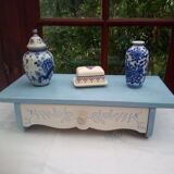 Old wooden shelf with drawer