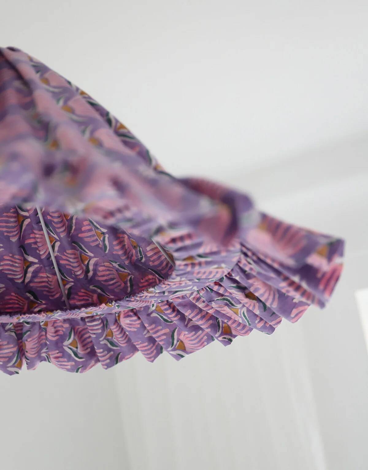 Emilia "purple shell flowers" conical textile suspension with flounce