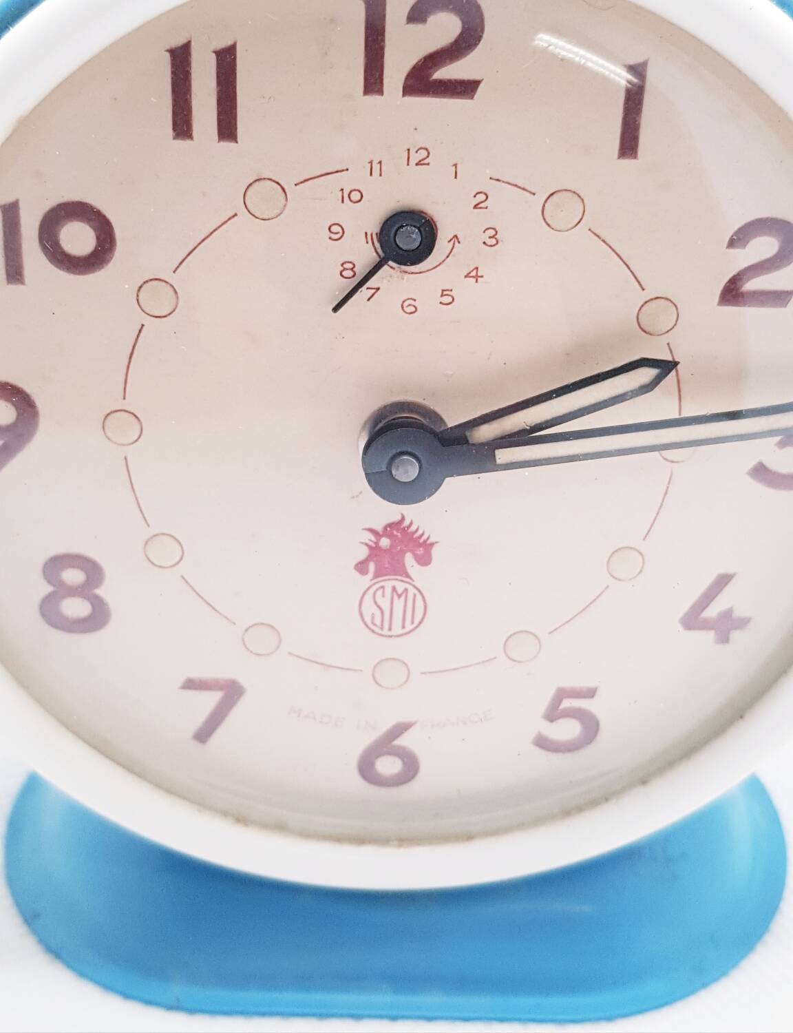 SMI blue alarm clock