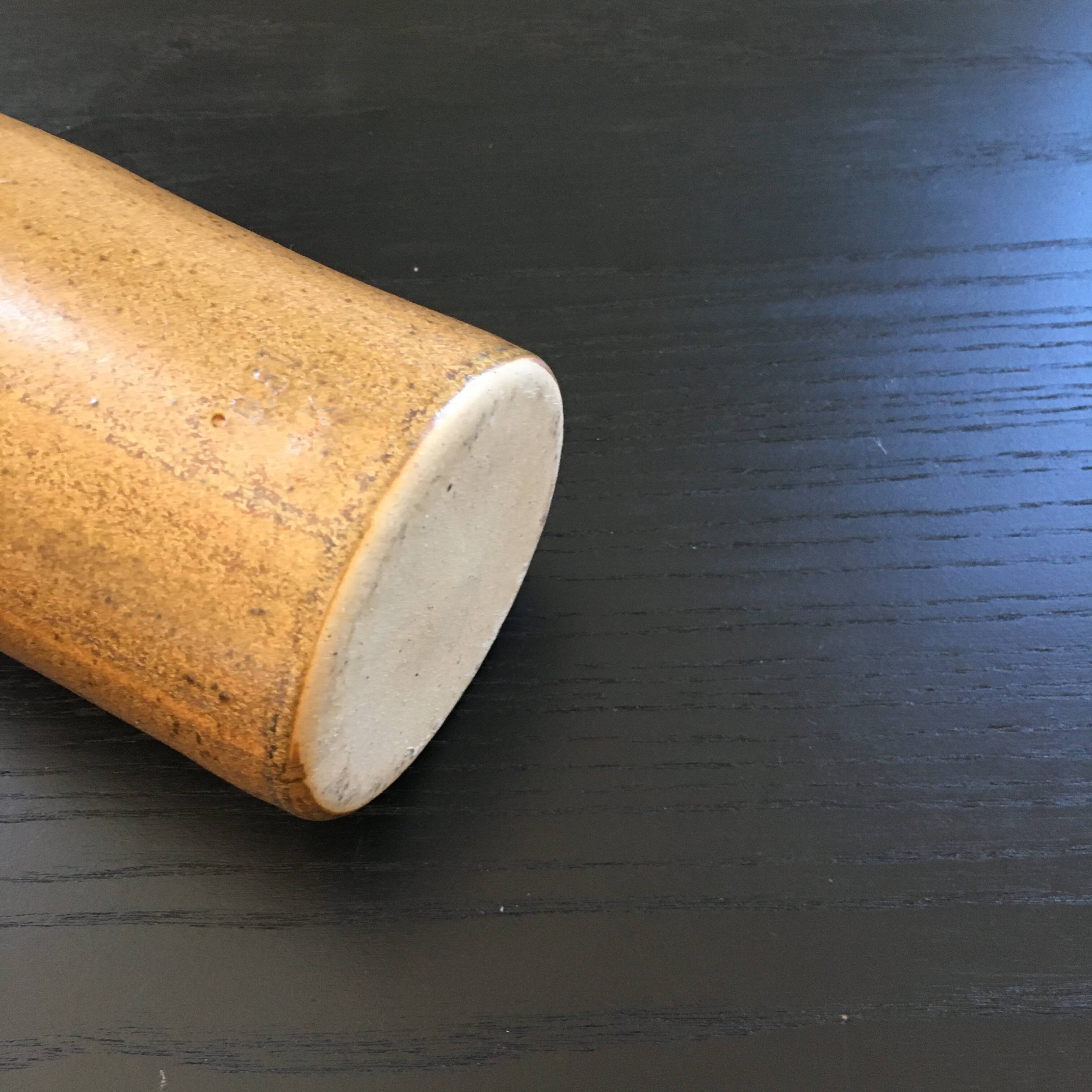 Beige stoneware bottle