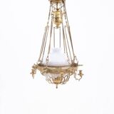 Brass chandelier from the first half of the 20th century.