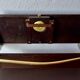 Old Scandinavian style magazine rack in dark wood with integrated brass ashtray