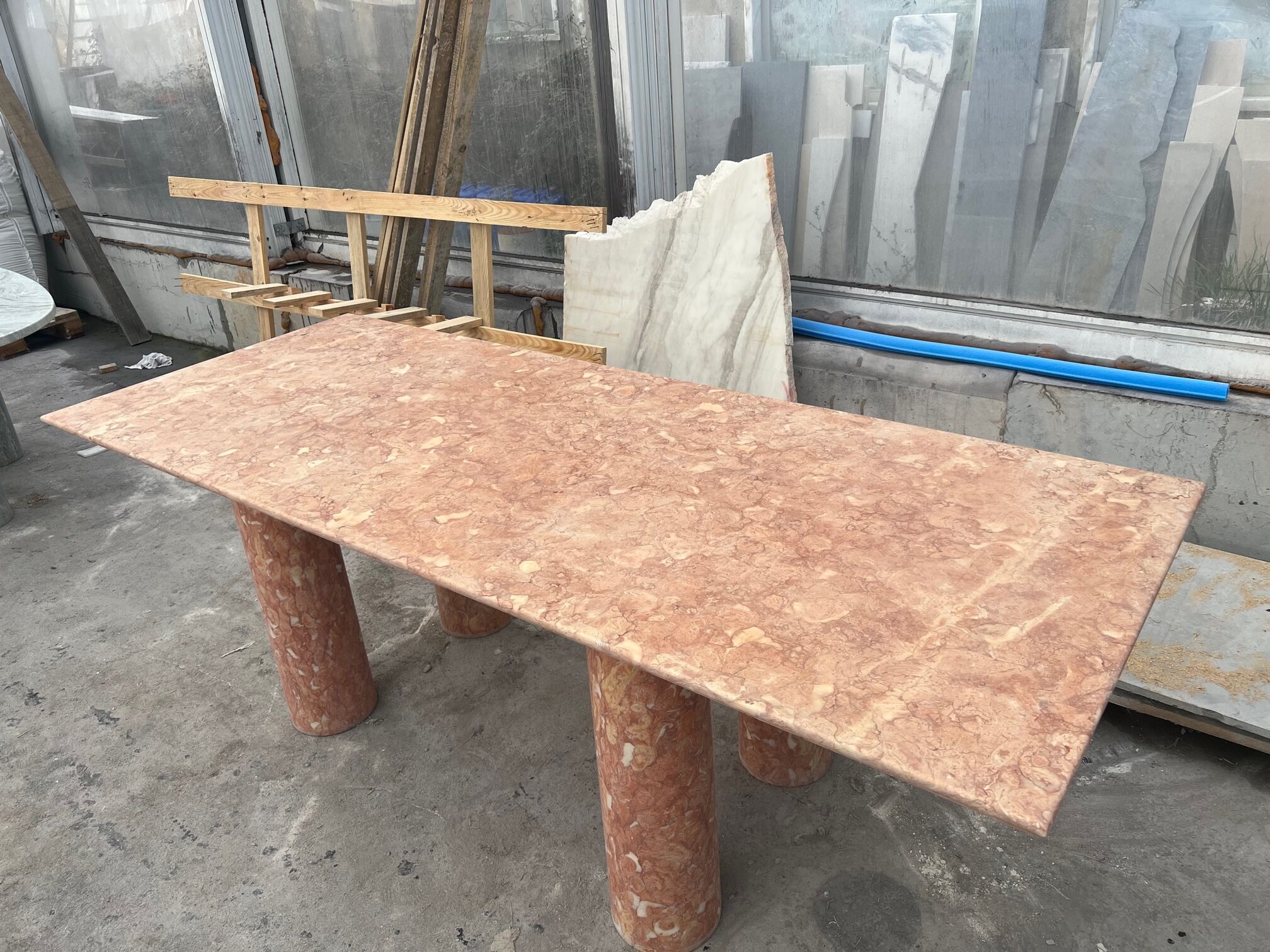Large rectangle stone dining table in red/pink Portuguese Travertine