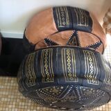 2 leather poufs