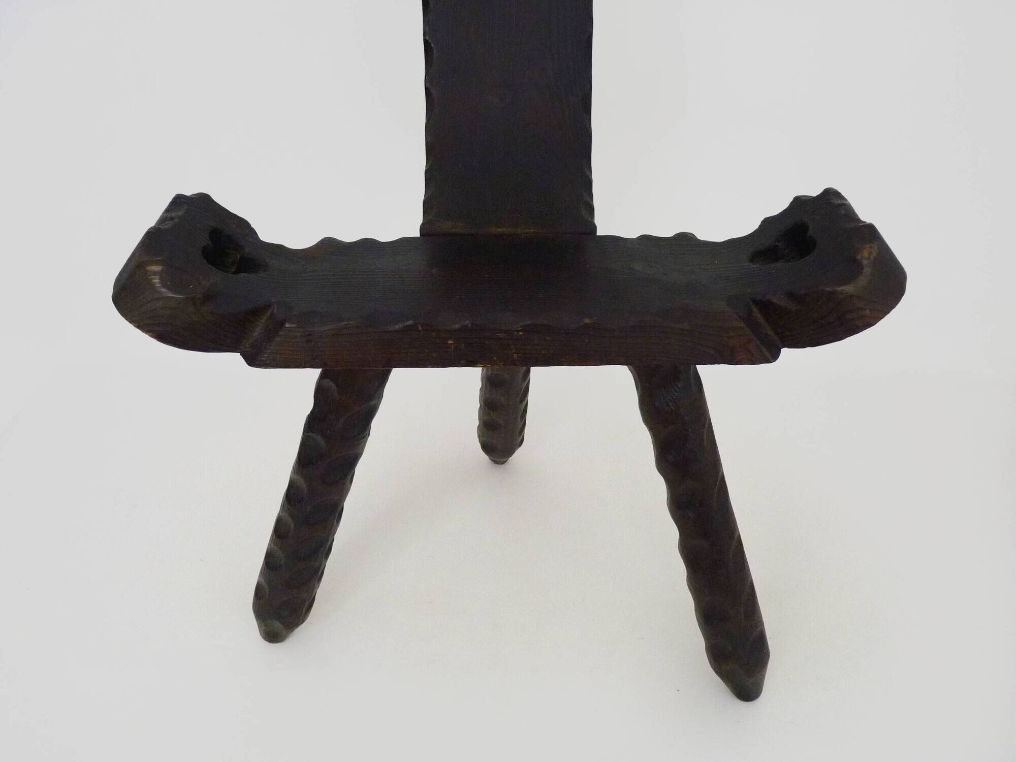 Brutalist tripod chair in raw wood. solid wood chair